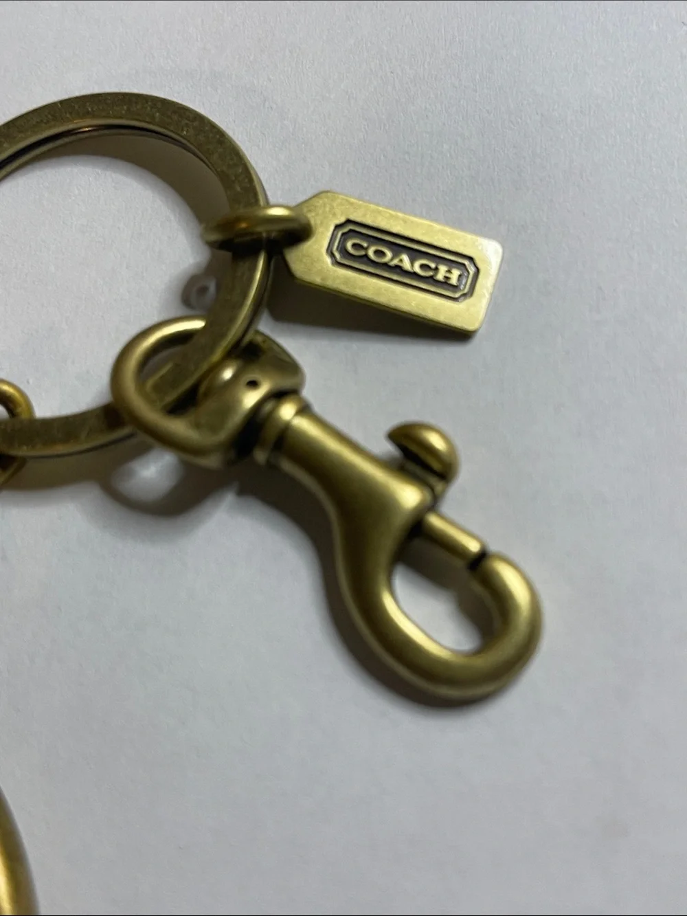 Coach Large Brass-Tone Script Circle Keyring/Bag Charm